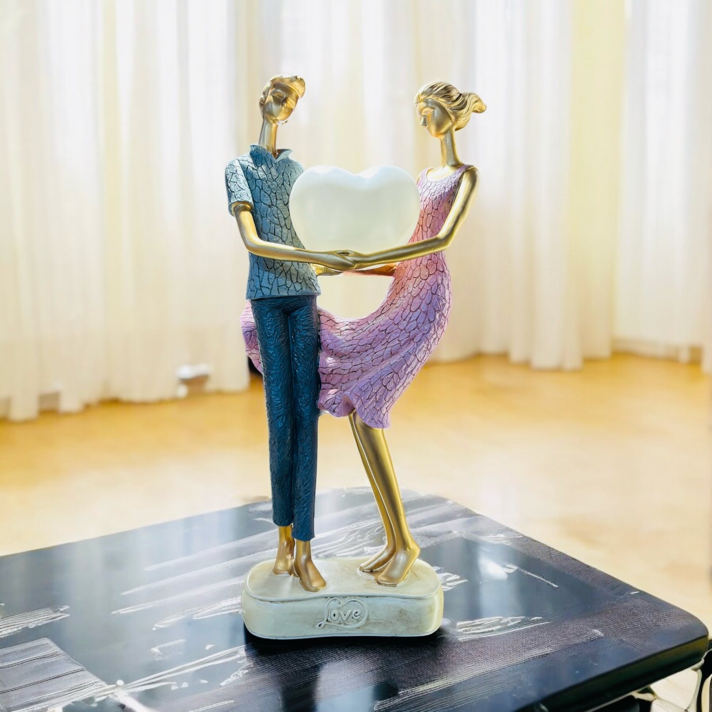 Eternal Love: Sculpted Couple with Heart Accent Ideal for Home Decor