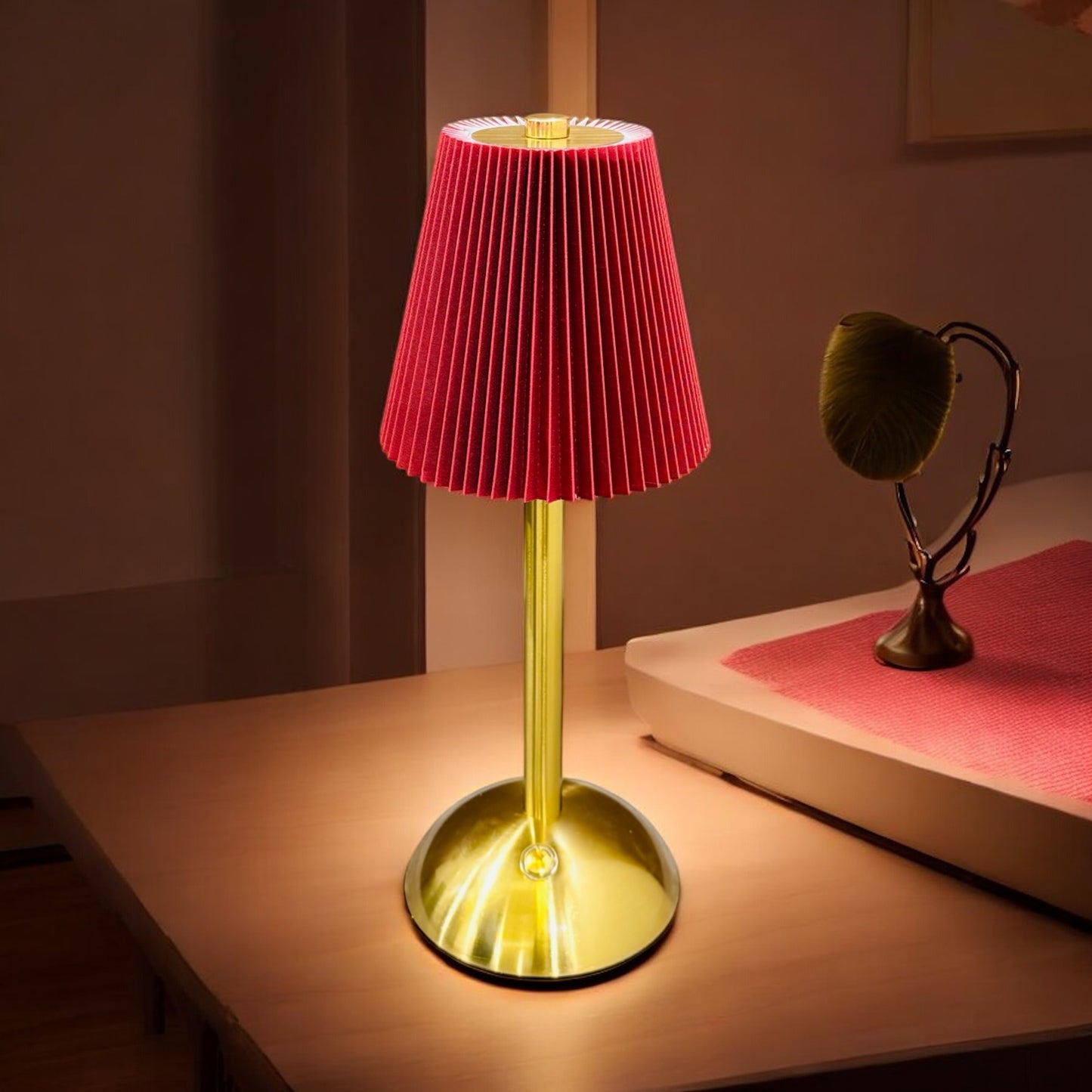 Elegant Gold Table Lamp with Pleated Red Shade Design