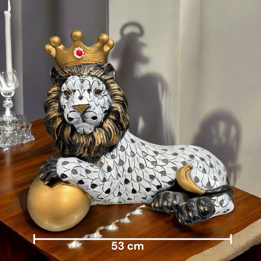 Black and White Crowned Lion Showpiece With a Golden Ball for Home Decor