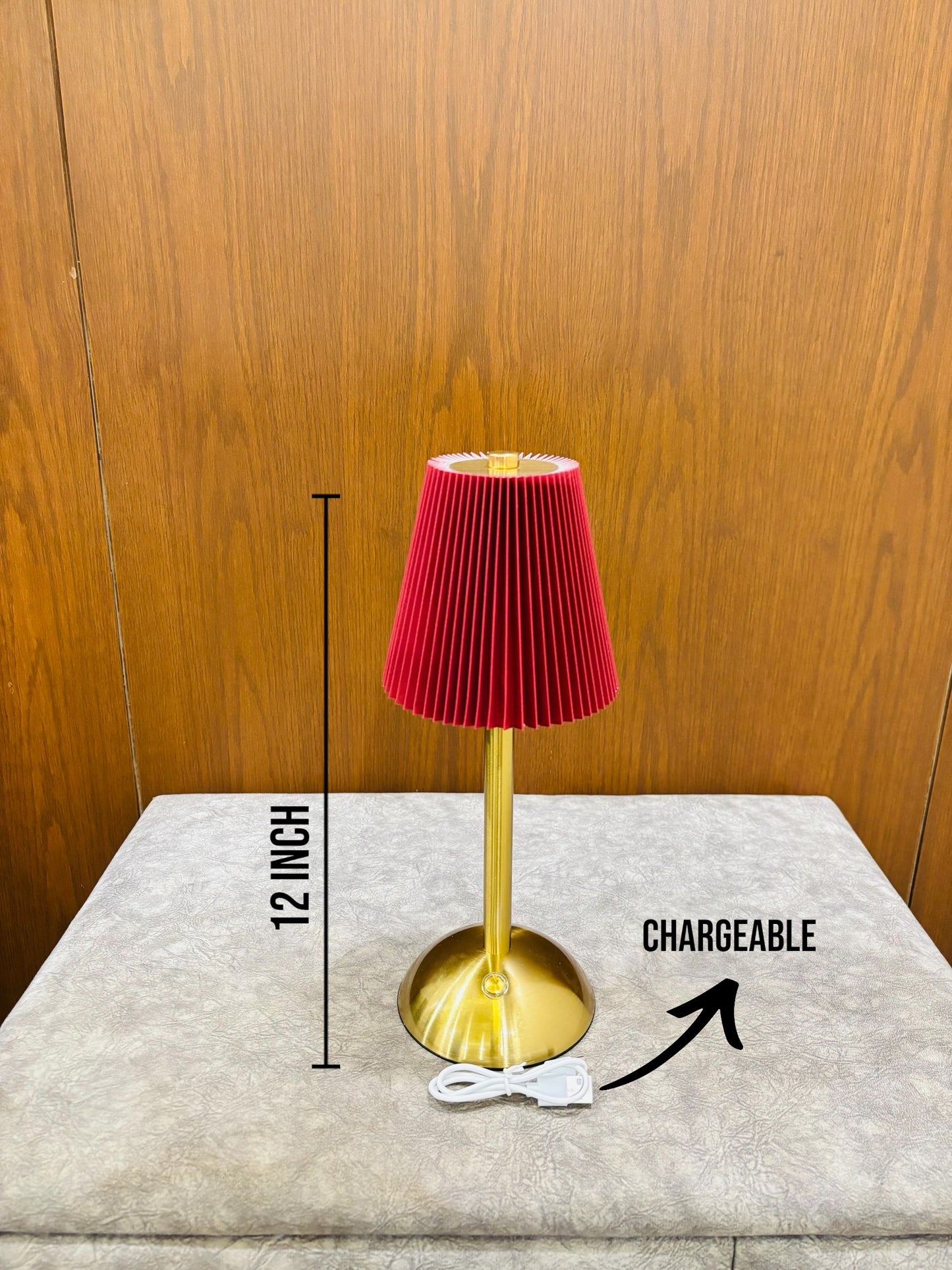 Elegant Gold Table Lamp with Pleated Red Shade Design