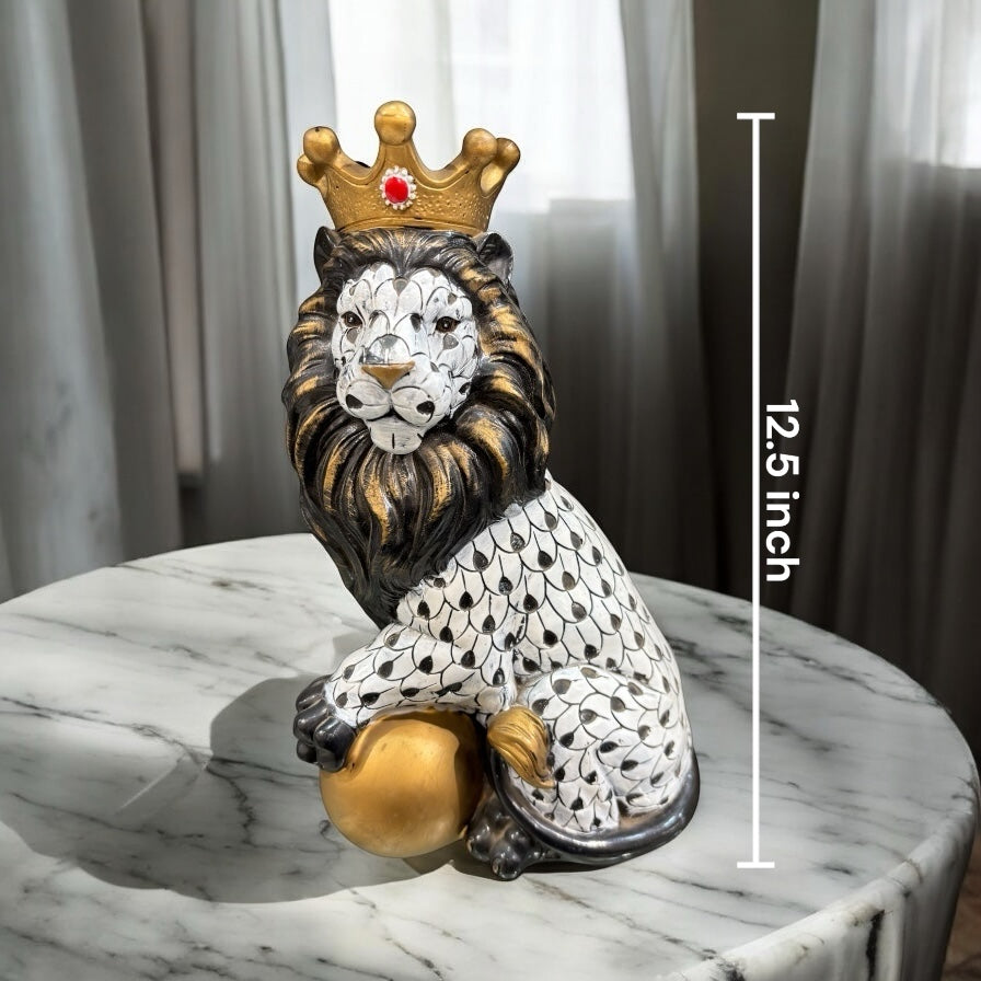 Black and White Crowned Lion Showpiece With a Golden Ball