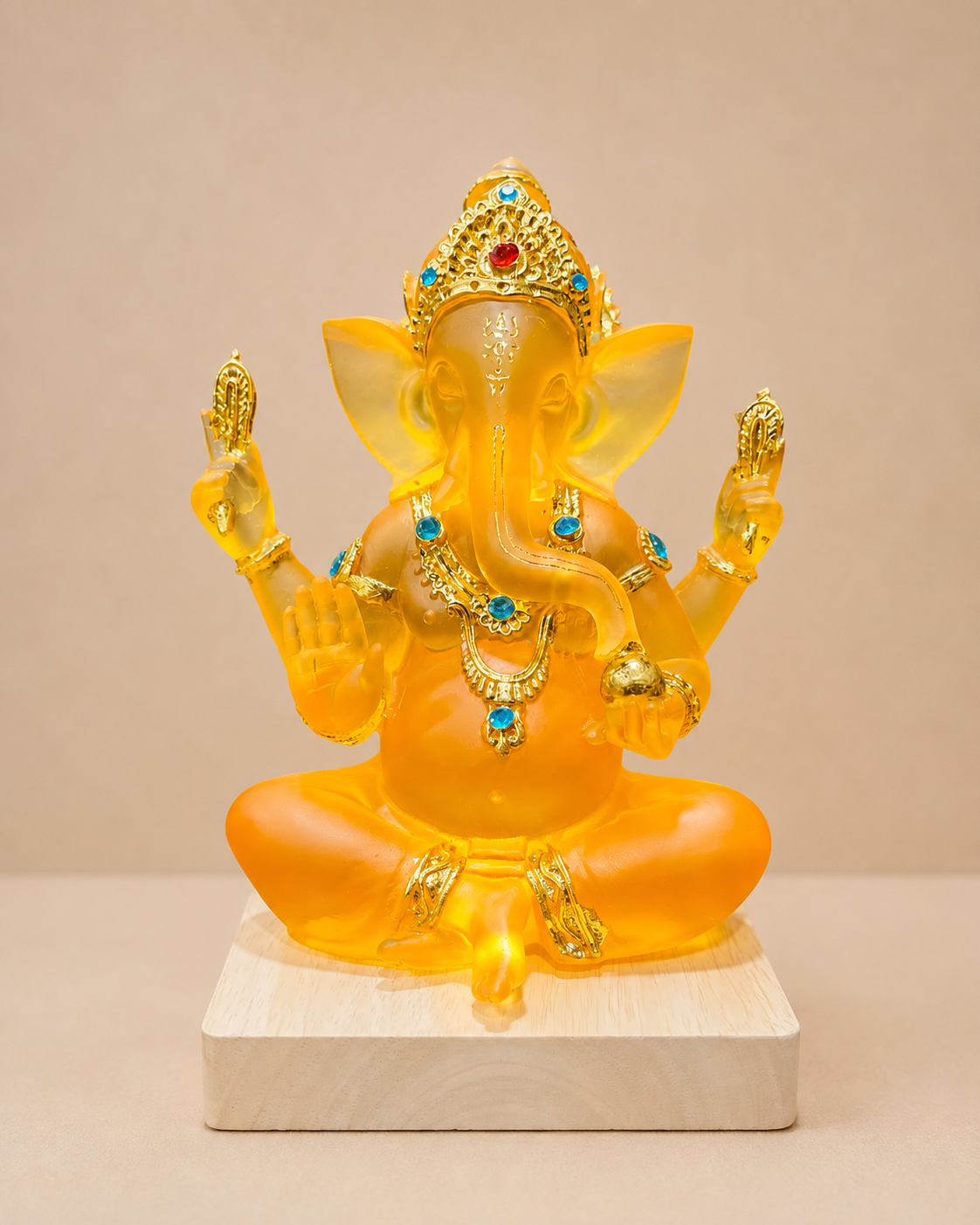 Luminous Amber Ganesha Resin Idol LED Lamp with Wooden Base, 8 Inches