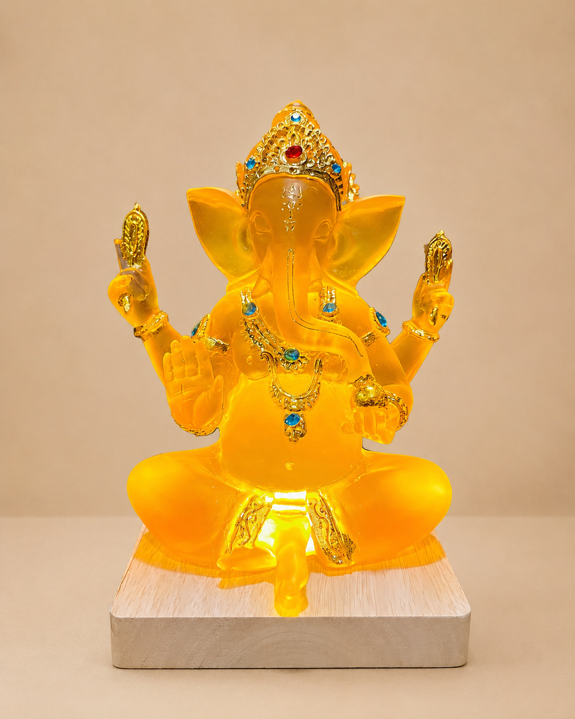 Luminous Amber Ganesha Resin Idol LED Lamp with Wooden Base, 8 Inches