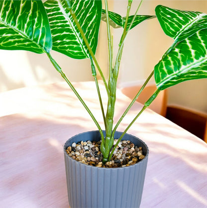 Artificial Tropical Leaf Plant in Minimalistic Fibre Pot with Pebbles for Home Decor