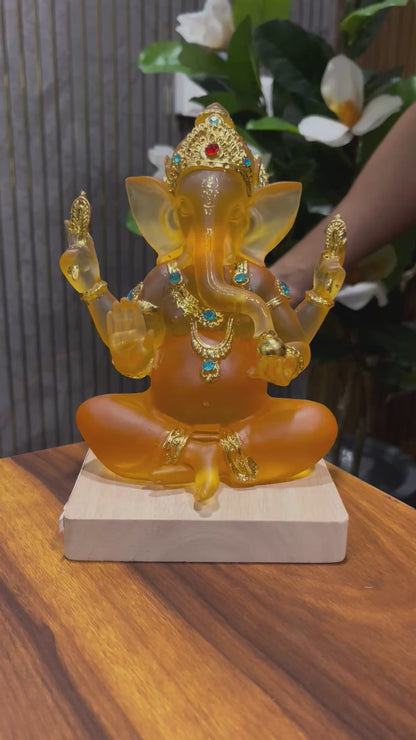 Luminous Amber Ganesha Resin Idol LED Lamp with Wooden Base, 8 Inches